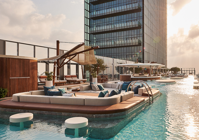 The spectacular 110-m horizon edge pool hosts wet and dry bars, DJ booths, Jacuzzis, floating party decks, day beds and cabanas, all facing the dramatic skyline.
